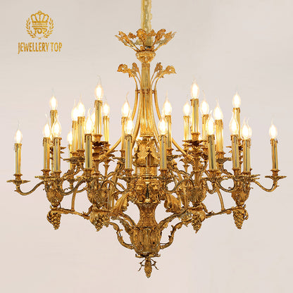JEWELLERY TOP brand's ornate brass chandelier with detailed metalwork against a clean background.