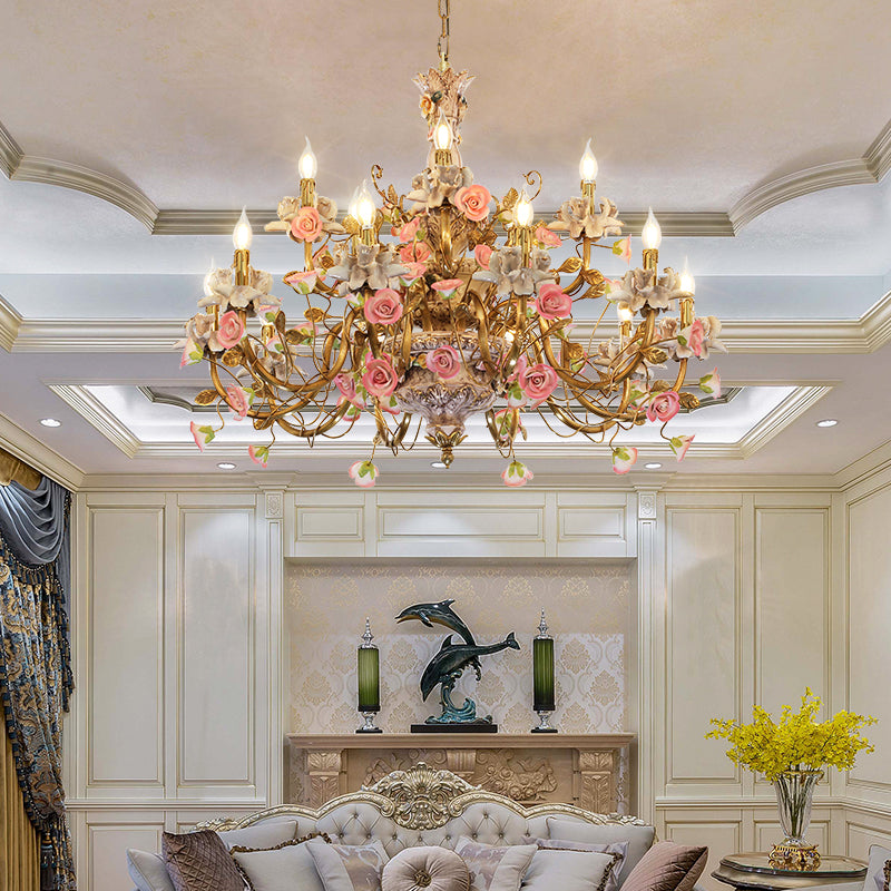 Fleur de Royaume brass chandelier installed in an elegant living room with classic moldings.