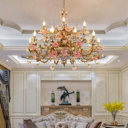 Fleur de Royaume brass chandelier installed in an elegant living room with classic moldings.