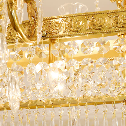 Macro shot of intricate brass engraving and sparkling square-cut crystal accents.