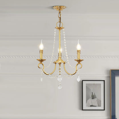 Classic French style miniature chandelier with glowing candle bulbs on a white ceiling.