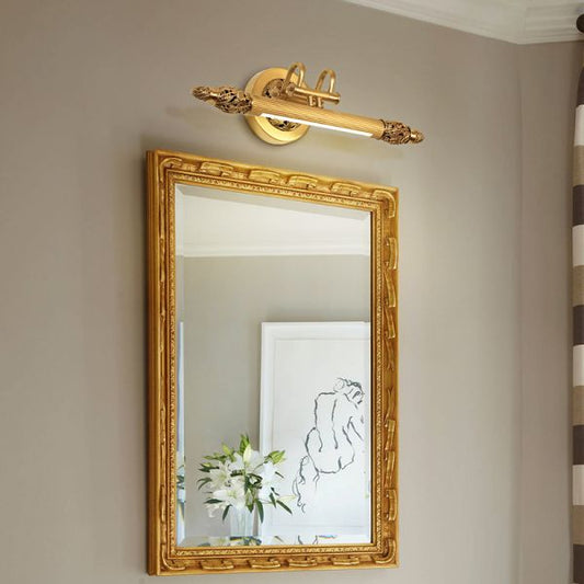 The French brass mirror wall lamp installed as a pair above a bathroom vanity with a large rectangular mirror.
