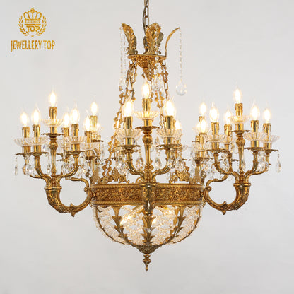 Angled perspective highlighting the symmetrical arrangement of numerous candle-style lights and the intricate central column.