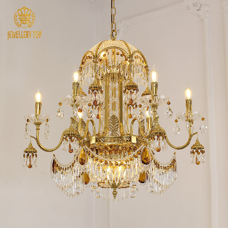 Angled perspective highlighting the symmetrical arrangement of candle-style lights and the ornate brass dome.