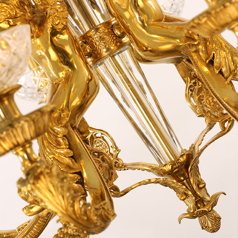 Macro close-up of a fluted glass bobeche and teardrop crystal pendant.