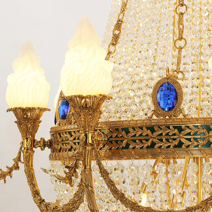 Extreme detail shot focusing on the candle-style flame bulbs and the ornate brass canopy at the top.