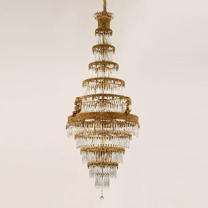 Front view of a luxury multi-level brass crystal chandelier for tall spaces.