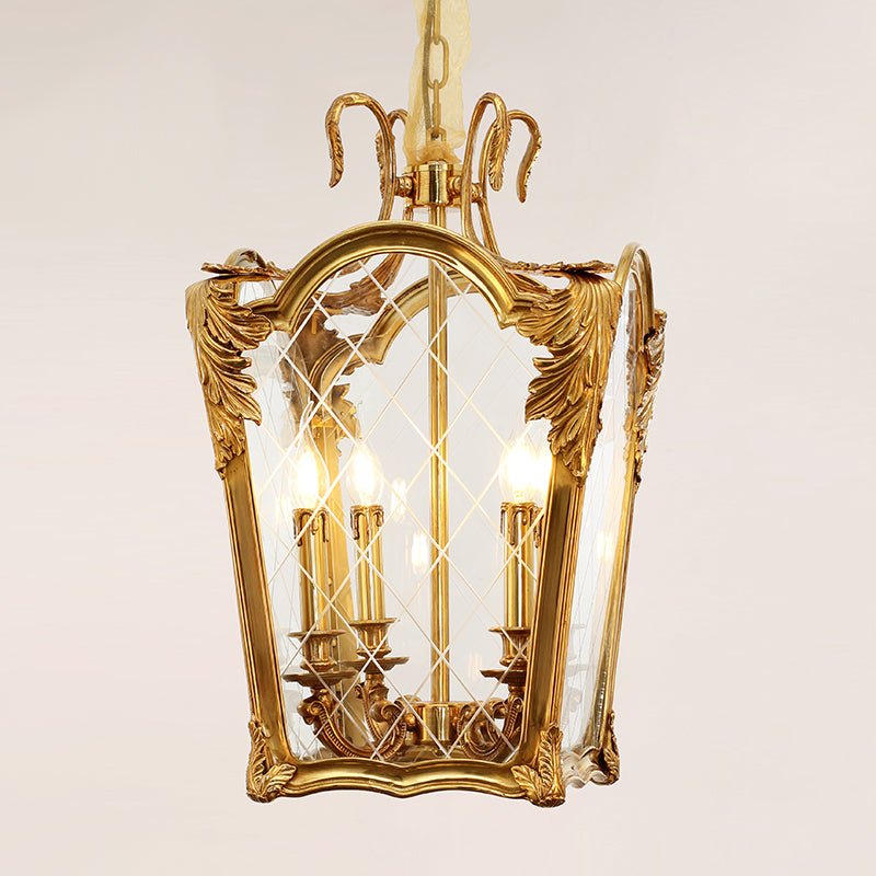 Detailed side view of a french vintage pendant light, highlighting its brass frame and candle bulbs.