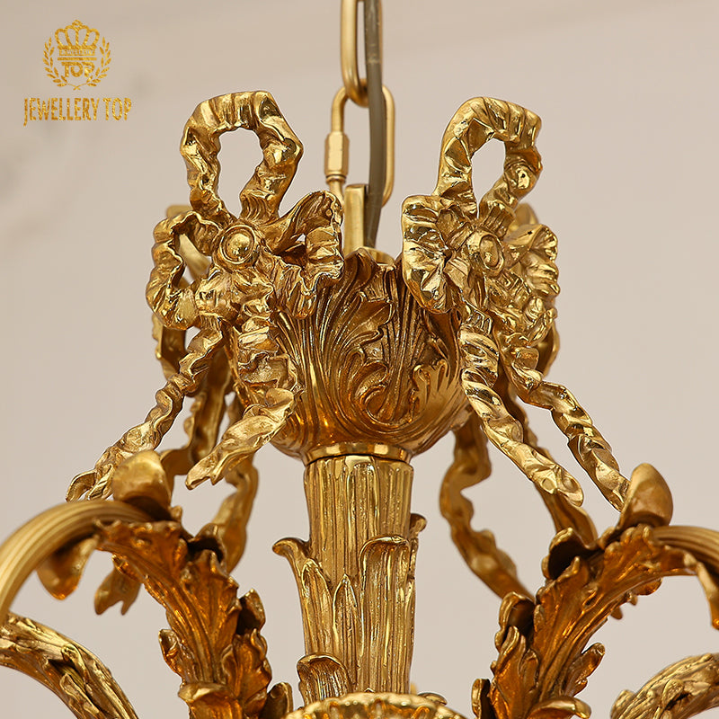 Extreme detail shot focusing on the sparkling cascading crystal strands within the light shades and the elaborate ceiling medallion.