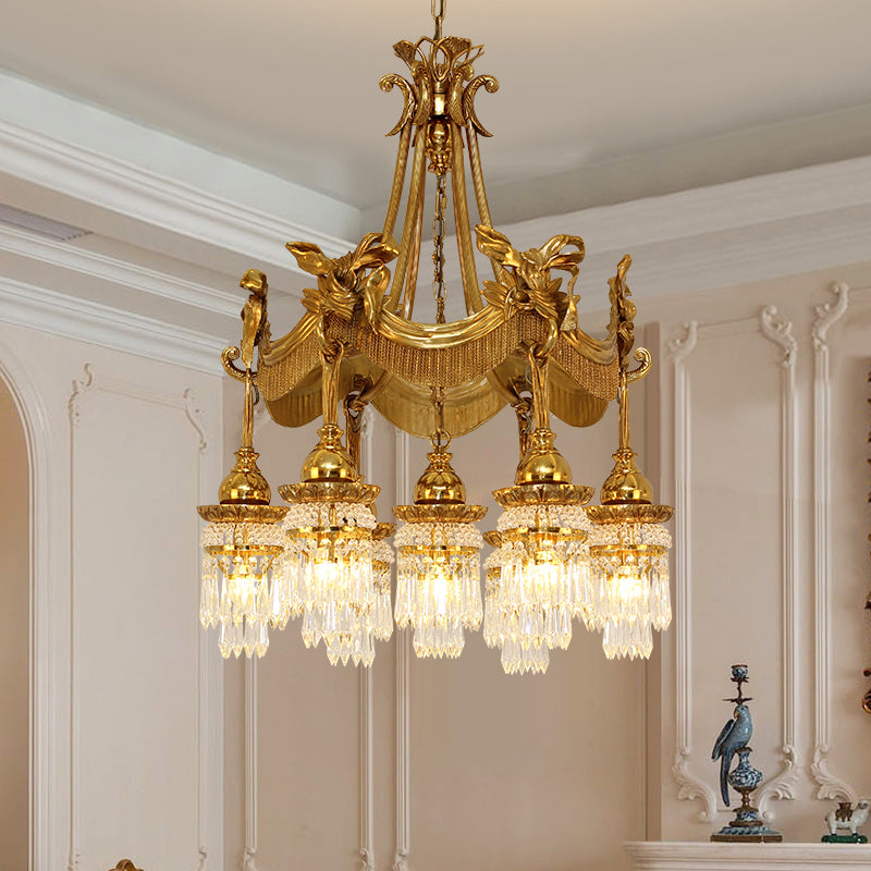 JEWELLERY TOP brand's luxury decorative chandelier highlighting the detailed winged goddess sculpture and draped fabric-inspired metalwork.