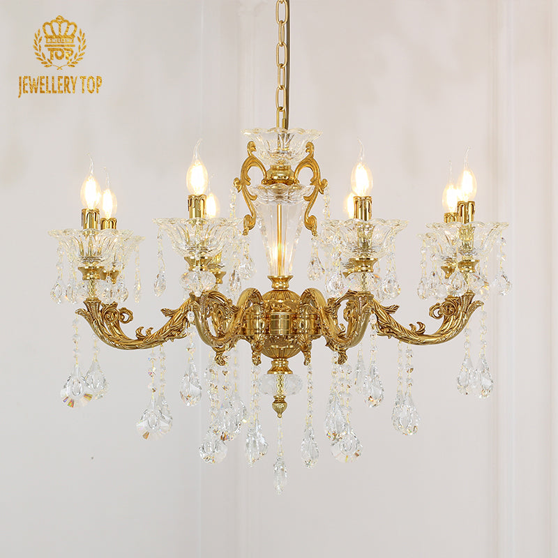 Macro close-up of the finely detailed golden acanthus leaf cup and the teardrop-shaped crystal pendants.
