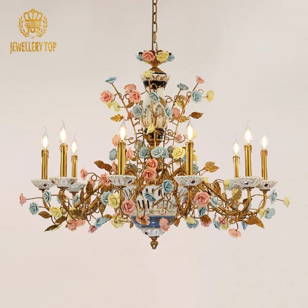 Angled perspective highlighting the symmetrical arrangement of multiple lights and the abundant ceramic floral decorations.