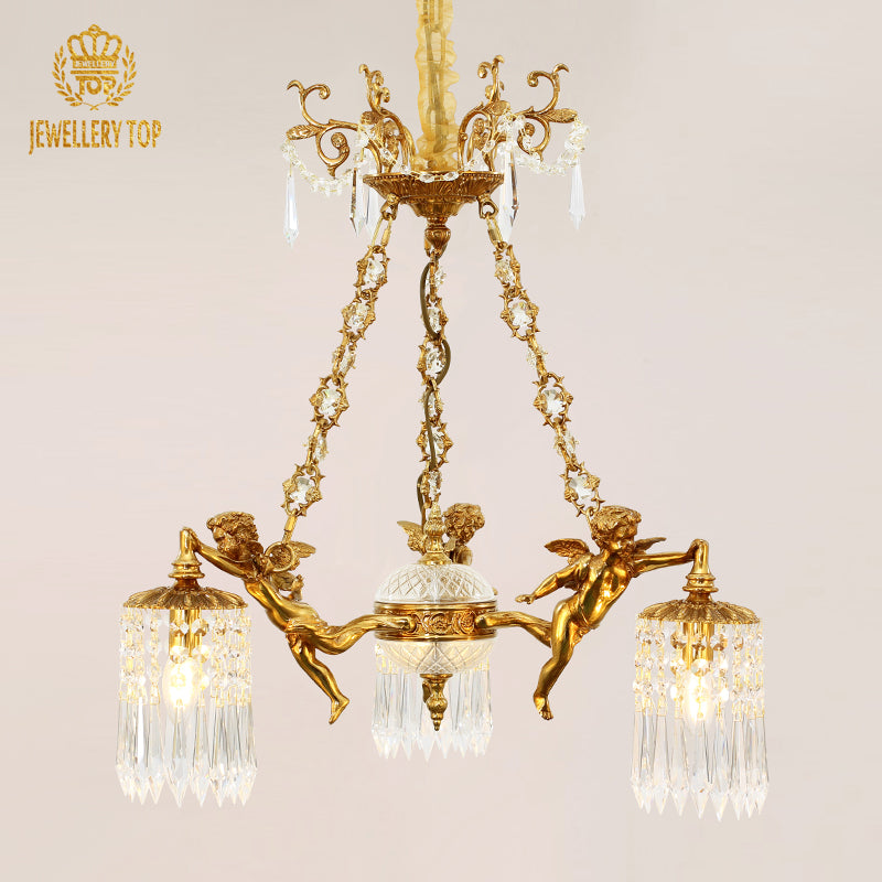Close-up brand shot of a JEWELLERY TOP cherub brass chandelier with crystal beads and lampshade.
