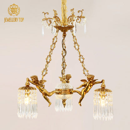 Close-up brand shot of a JEWELLERY TOP cherub brass chandelier with crystal beads and lampshade.