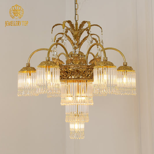 French crystal decorative brass chandelier installed in an elegant living room with gold decor.