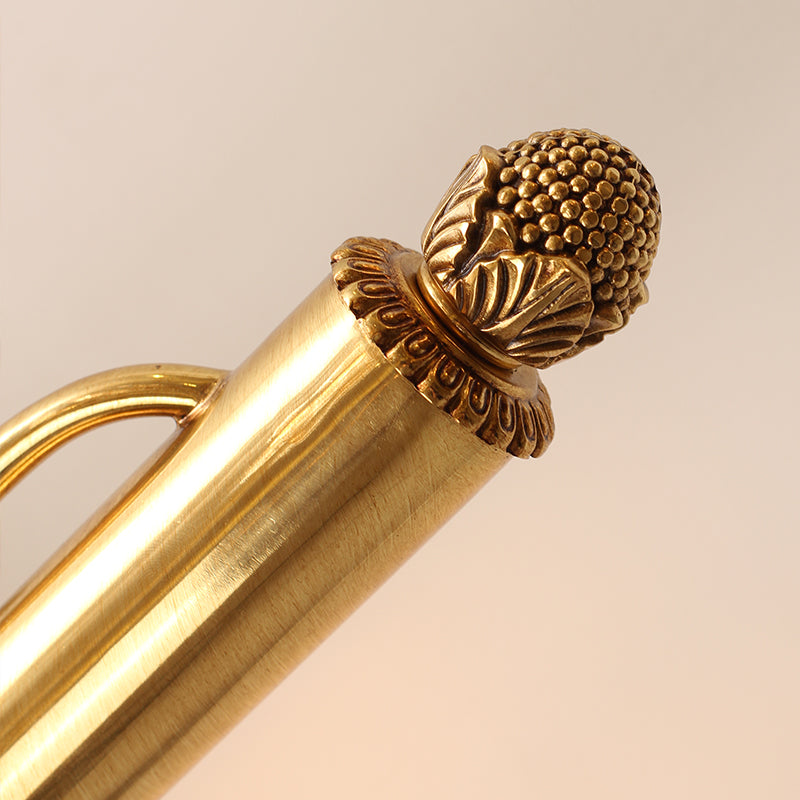 Extreme macro close-up of one decorative end ball, showing its detailed texture and perfect spherical form.