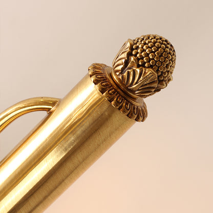 Extreme macro close-up of one decorative end ball, showing its detailed texture and perfect spherical form.