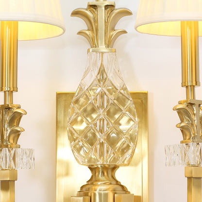 Detailed view of the wall mounting plate and the connection point, highlighting the solid brass construction and finish.