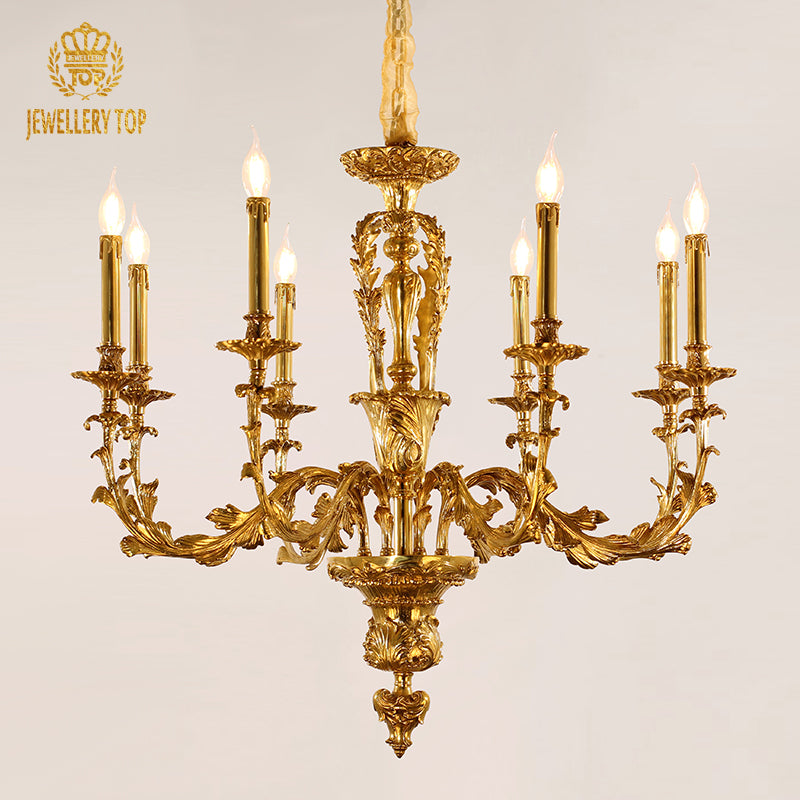 JEWELLERY TOP brand’s all copper crystal chandelier with candle bulbs against a white wall.