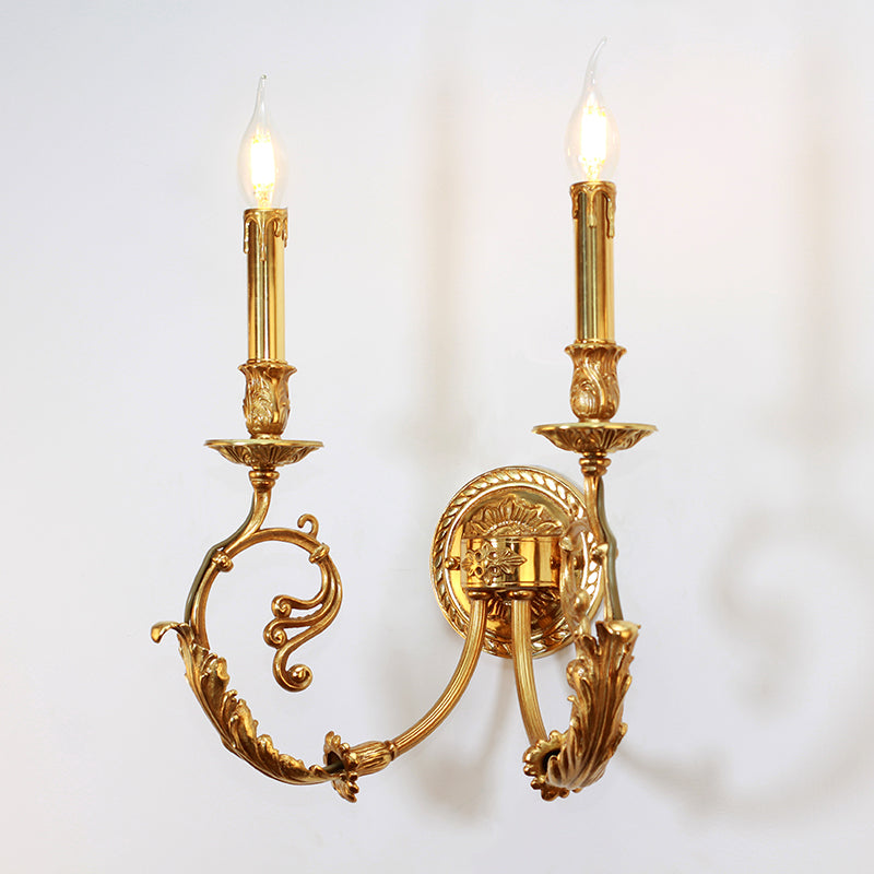 The bedroom wall light emitting a warm glow, mounted on a clean white wall in a classic interior setting.