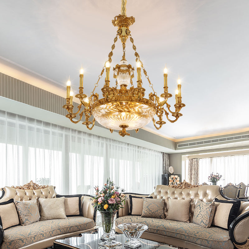 A vintage chandelier installed in a luxurious french home interior with ornate ceiling details.