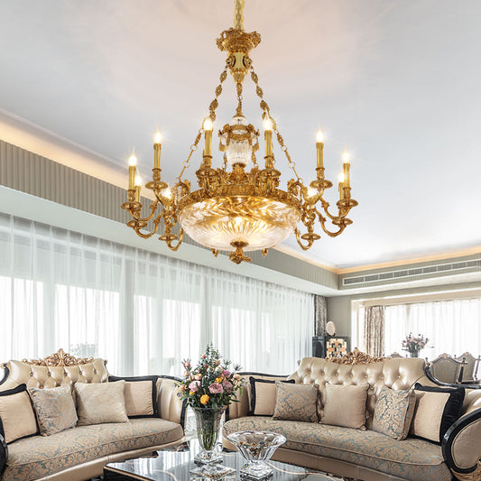 A vintage chandelier installed in a luxurious french home interior with ornate ceiling details.