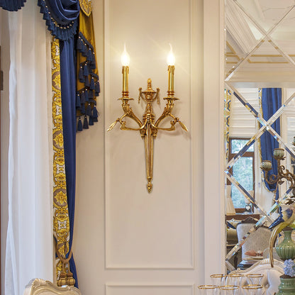 The French-style brass wall lamp beside a decorative mirror and luxurious blue-tasseled curtains in an elegant interior.