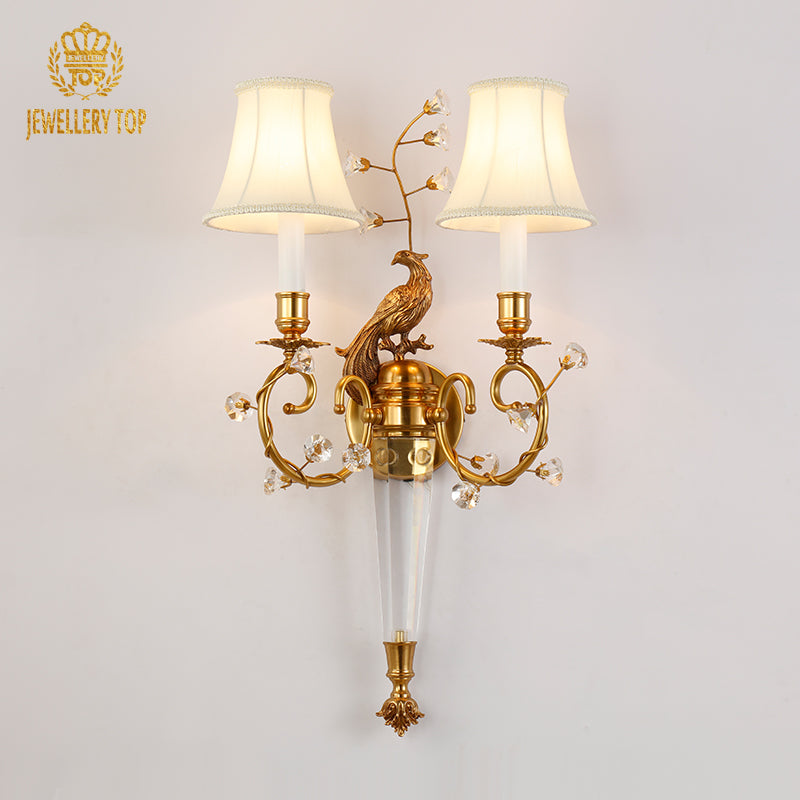 The European antique wall light installed on a classic wall, emitting a warm glow beside elegant home decor.