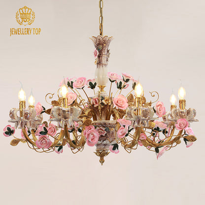 JEWELLERY TOP brand's brass and ceramic flower chandelier, side view on white.