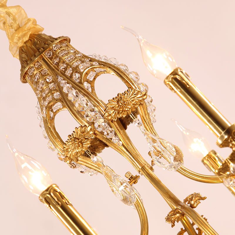Extreme detail shot of the finely cast golden rosette and foliate embellishments.